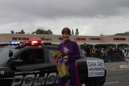 Westminster Councilwoman Diana Carey participates in the 2013 Tet Parade in Westminster holding LBGT Pride Flag in support of the LGBT group barred from participating in the parade.